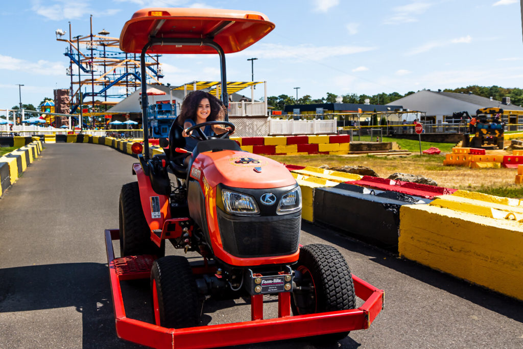orange tractor driving Diggerland USA fun things to do in NJ