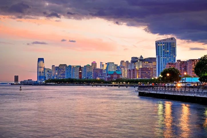 things to do in Jersey City nj mom Sunset-over-Jersey-City,-NJ-185057298_725x483